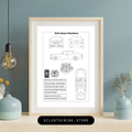 Framed blueprint of a Rolls Royce Phantom on a wall with decorative elements.